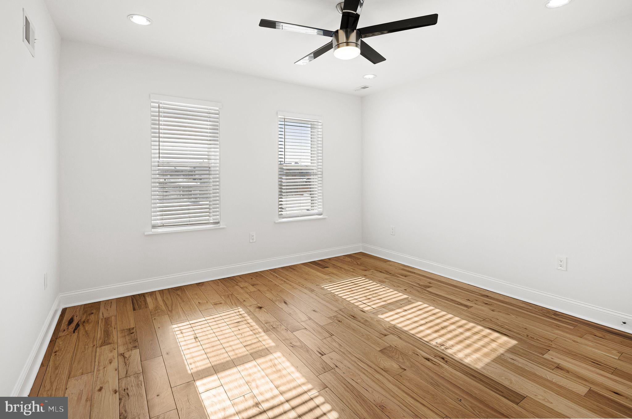 640 Emily Street Philadelphia, PA 19148 - Photo 9 of 15 a view of empty room with wooden floor and fan