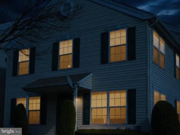 a brick building with large windows