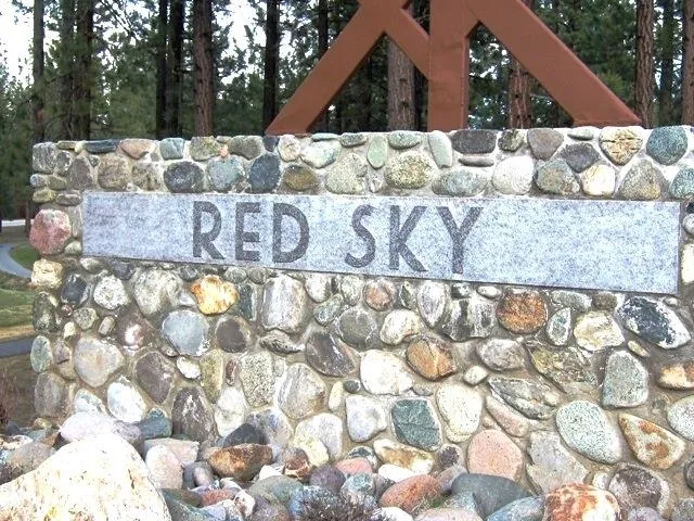 a view of a house with a parking area