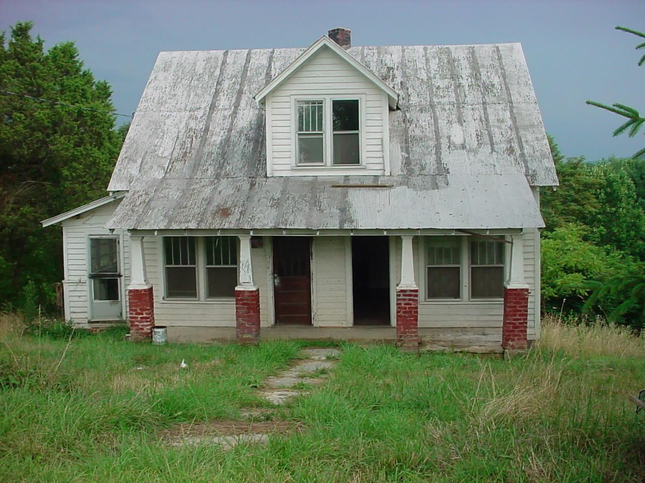 2247 Lick Ridge Road Northeast Check, VA 24072 - Photo 1 of 6 a front view of a house with a yard and garage