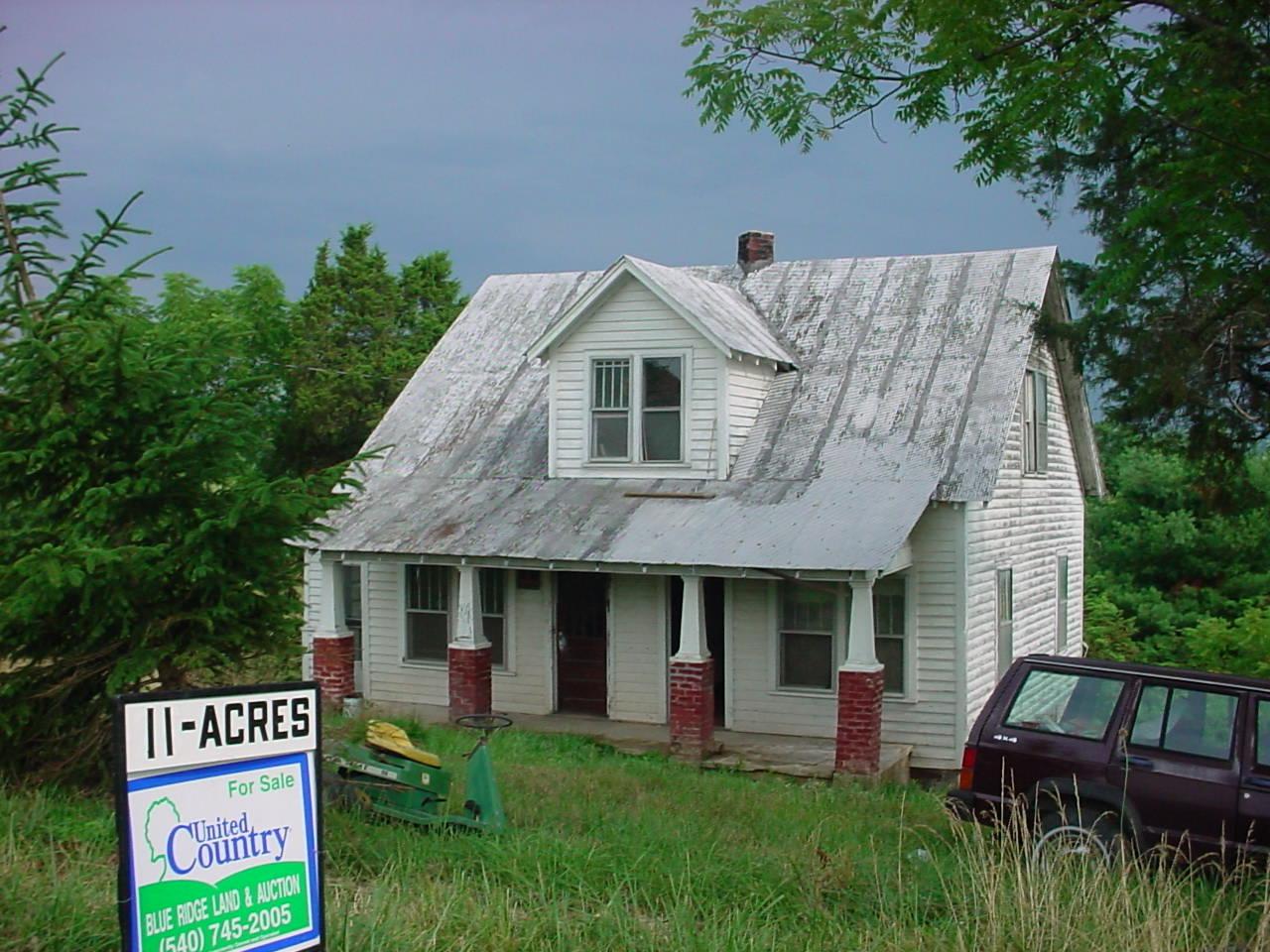2247 Lick Ridge Road Northeast Check, VA 24072 - Photo 2 of 6 a front view of a house with garden