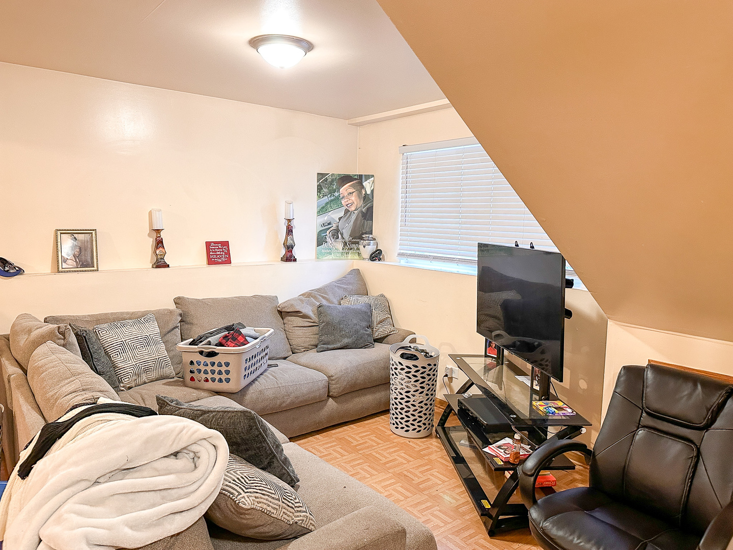 695 Moore Street Kankakee, IL 60901 - Photo 12 of 15 a living room with furniture and a flat screen tv