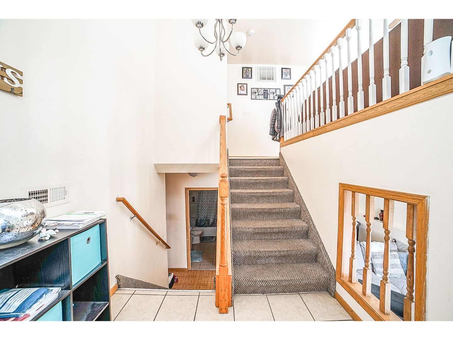 695 Moore Street Kankakee, IL 60901 - Photo 2 of 15 a view of entryway and hall with wooden floor