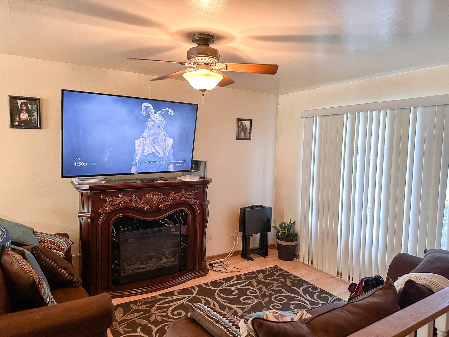 695 Moore Street Kankakee, IL 60901 - Photo 3 of 15 a living room with furniture and a fireplace