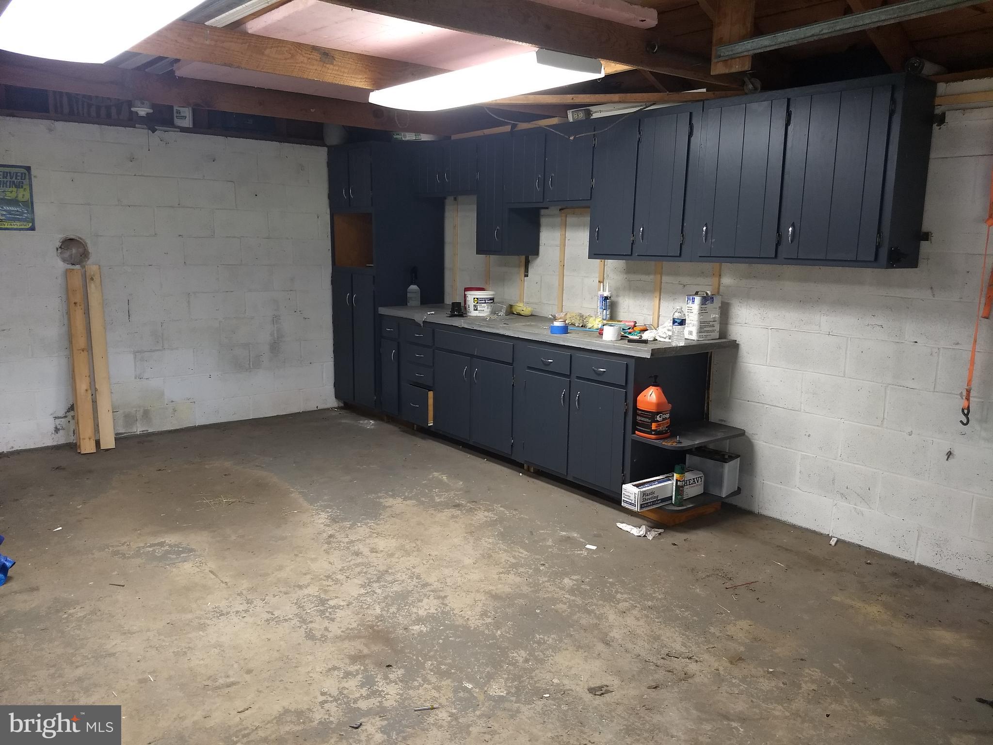 6426 Forest Grove Road Parsonsburg, MD 21849 - Photo 23 of 23 Garage cabinets/counter.