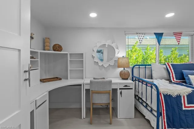 a room with furniture and a window