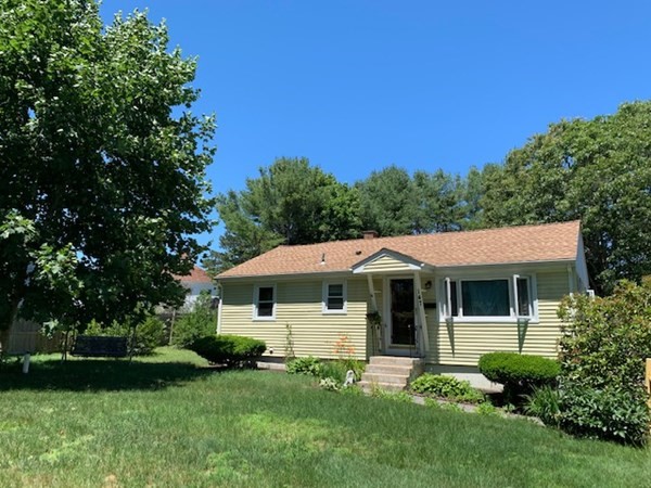 147 Puritan Road Bourne, MA 02532 - Photo 1 of 17 a view of a house with a yard