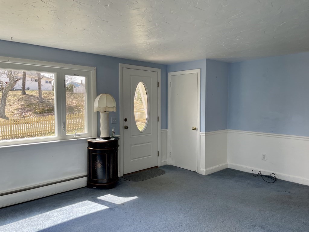 147 Puritan Road Bourne, MA 02532 - Photo 6 of 17 an empty room with windows