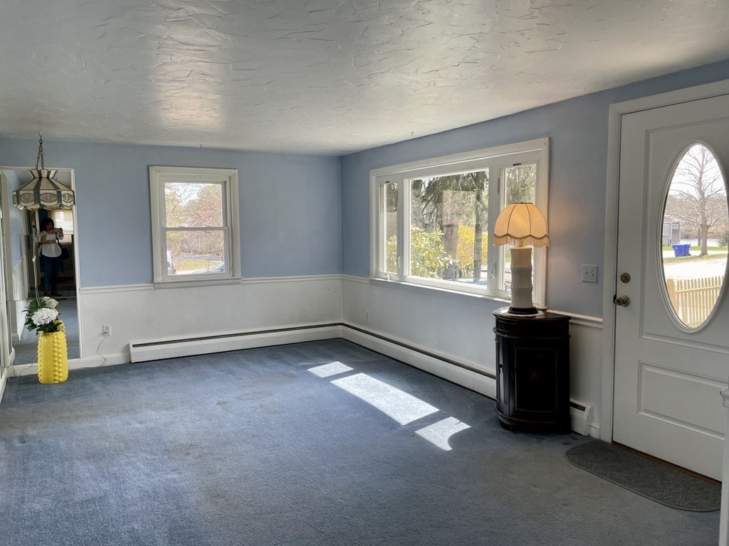 147 Puritan Road Bourne, MA 02532 - Photo 7 of 17 an empty room with windows