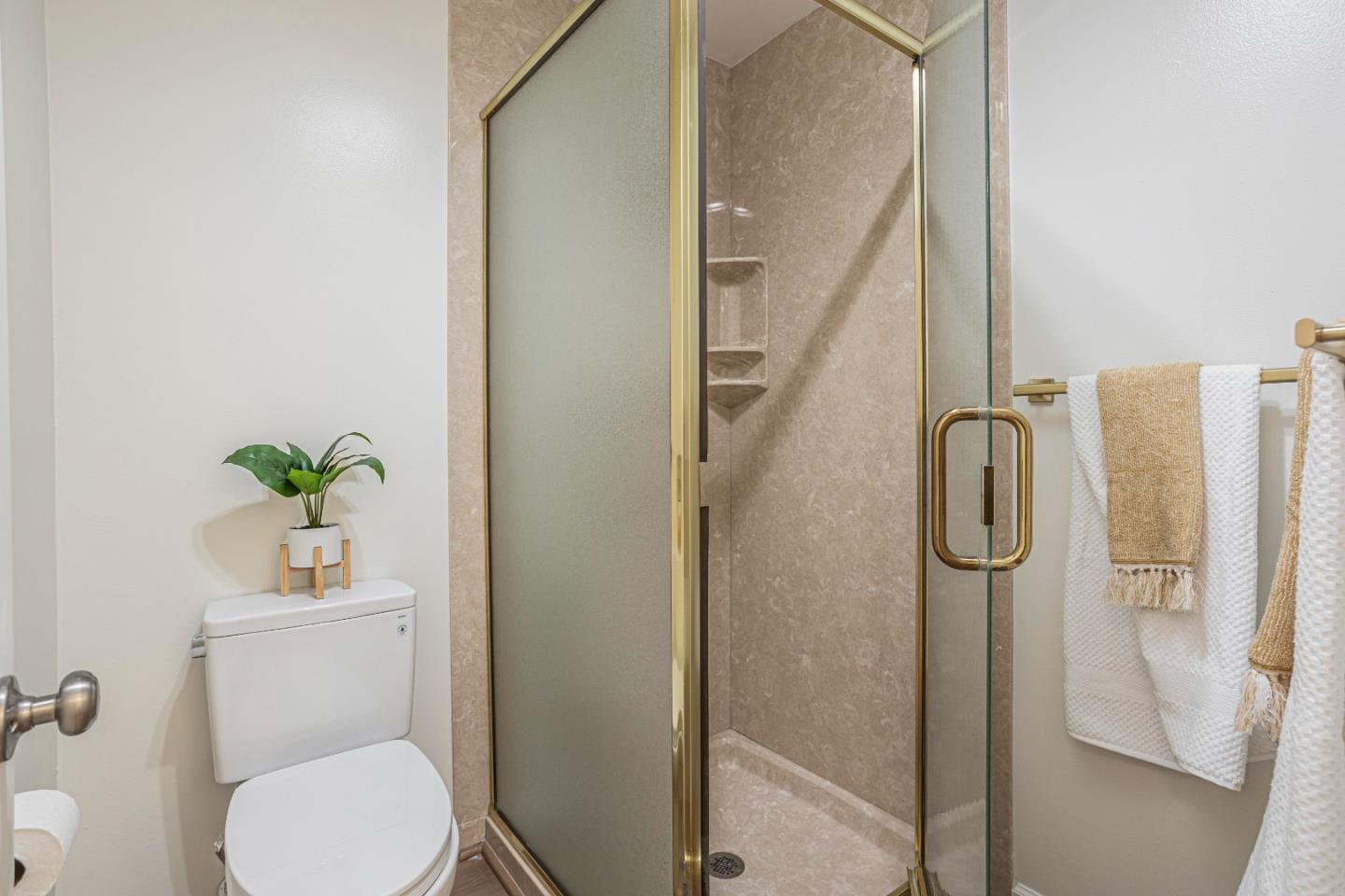 1033 Crestview Drive, Unit 309 Mountain View, CA 94040 - Photo 25 of 50 a bathroom with a toilet and a shower