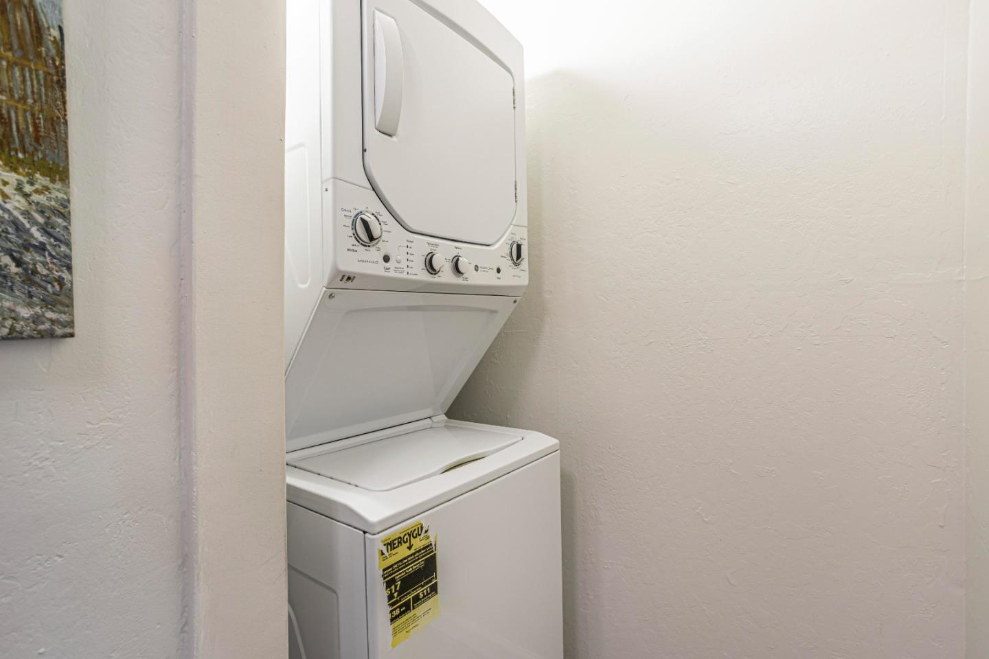 1033 Crestview Drive, Unit 309 Mountain View, CA 94040 - Photo 32 of 50 a utility room with dryer and washer