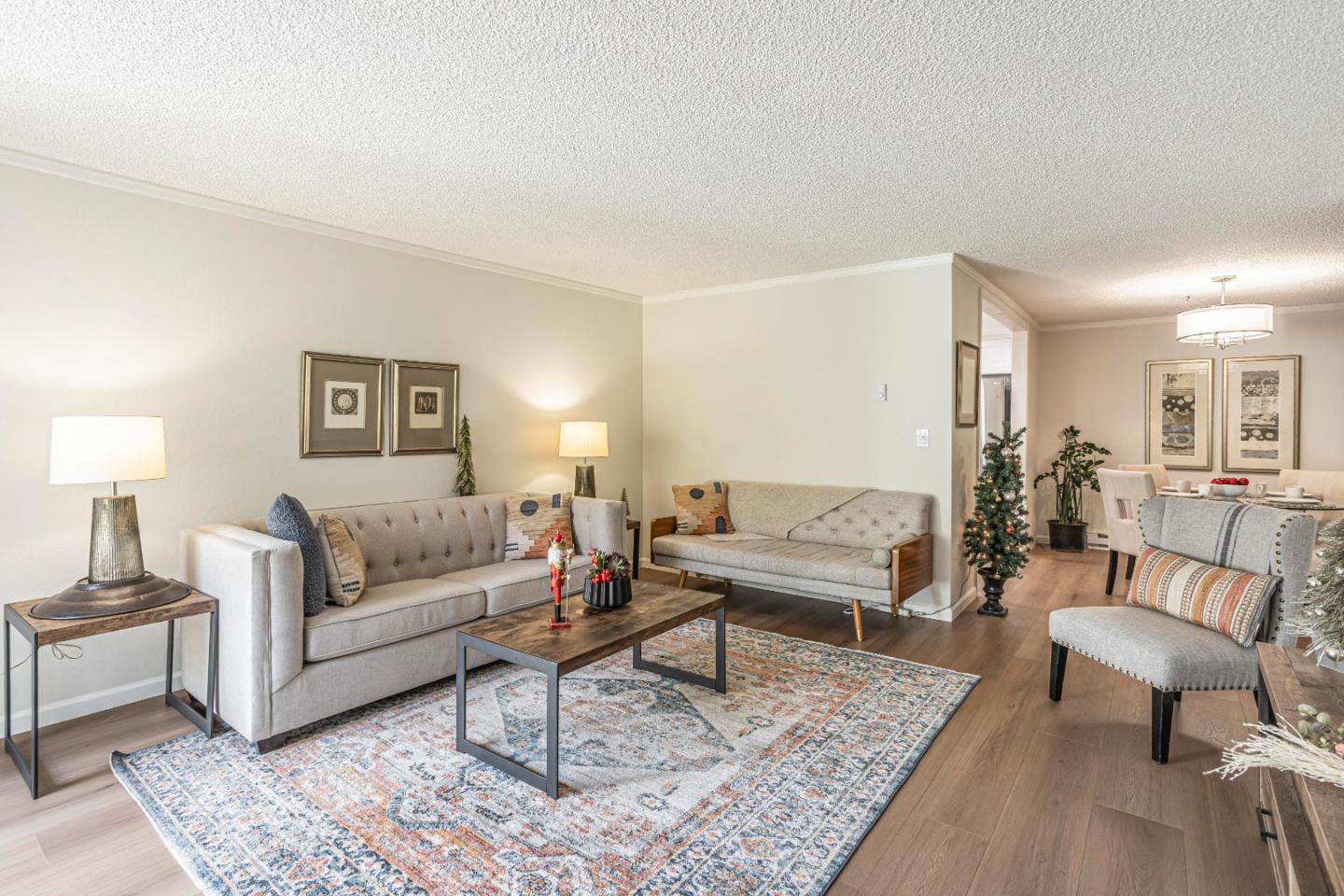 1033 Crestview Drive, Unit 309 Mountain View, CA 94040 - Photo 5 of 50 a living room with furniture and a rug