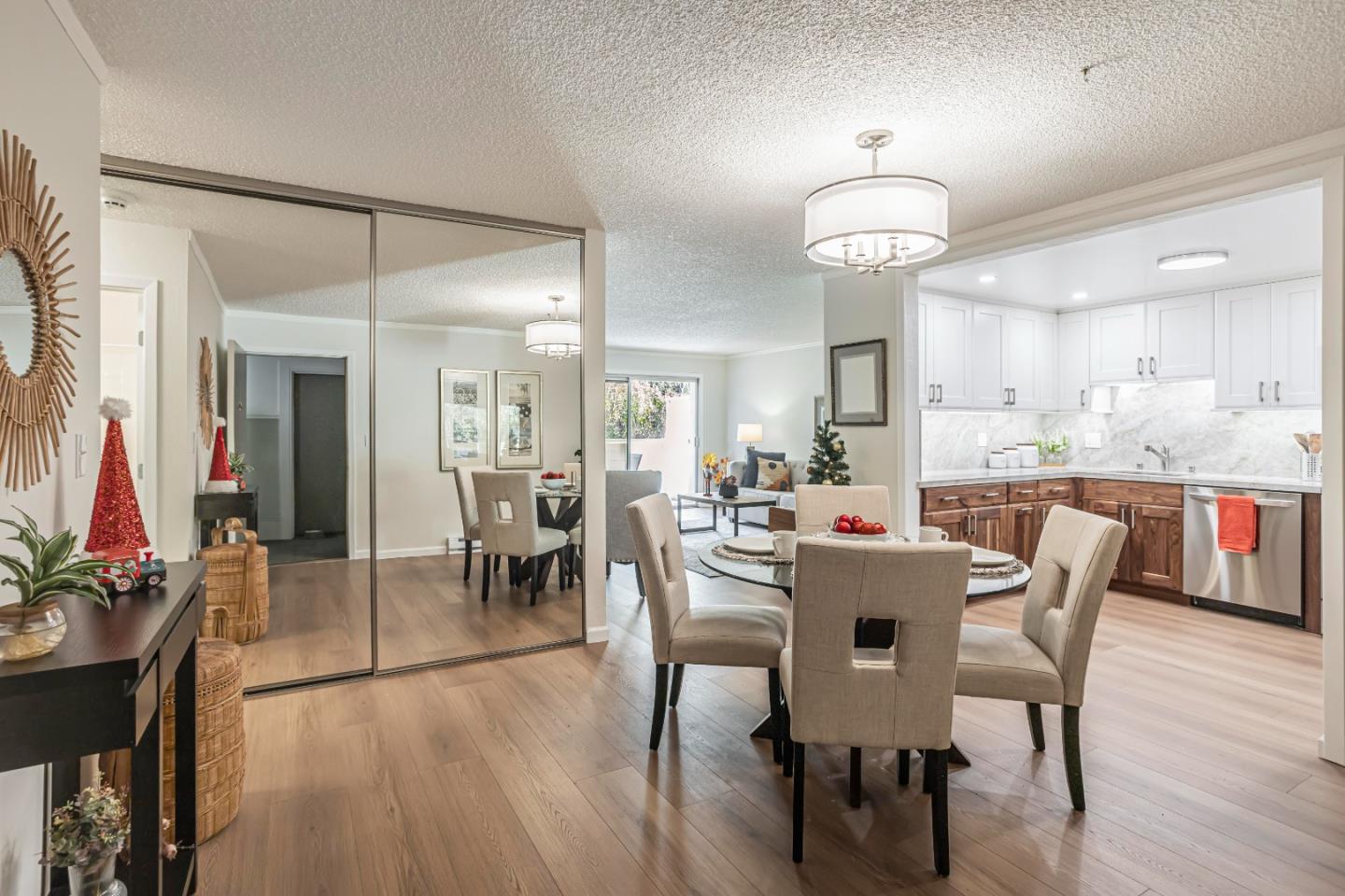 1033 Crestview Drive, Unit 309 Mountain View, CA 94040 - Photo 10 of 50 a view of a dining room with furniture and wooden floor