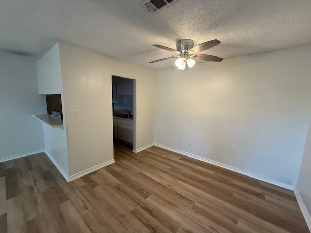 4217 I-69 Access Road, Unit 2 Corpus Christi, TX 78410 - Photo 3 of 14 wooden floor in an empty room