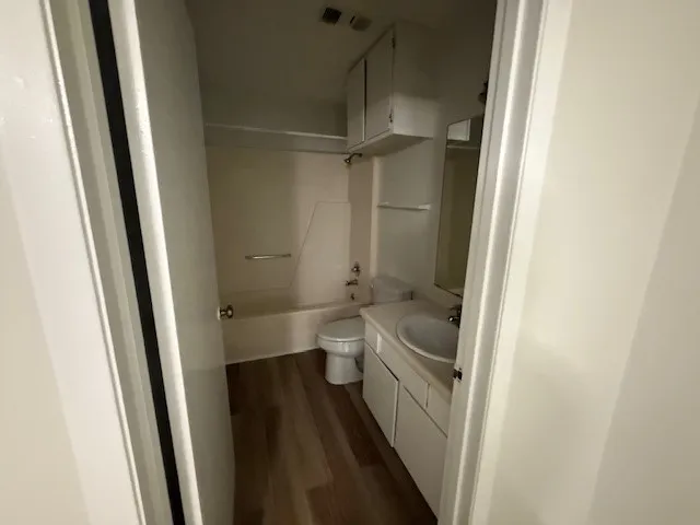 a bathroom with a sink and toilet