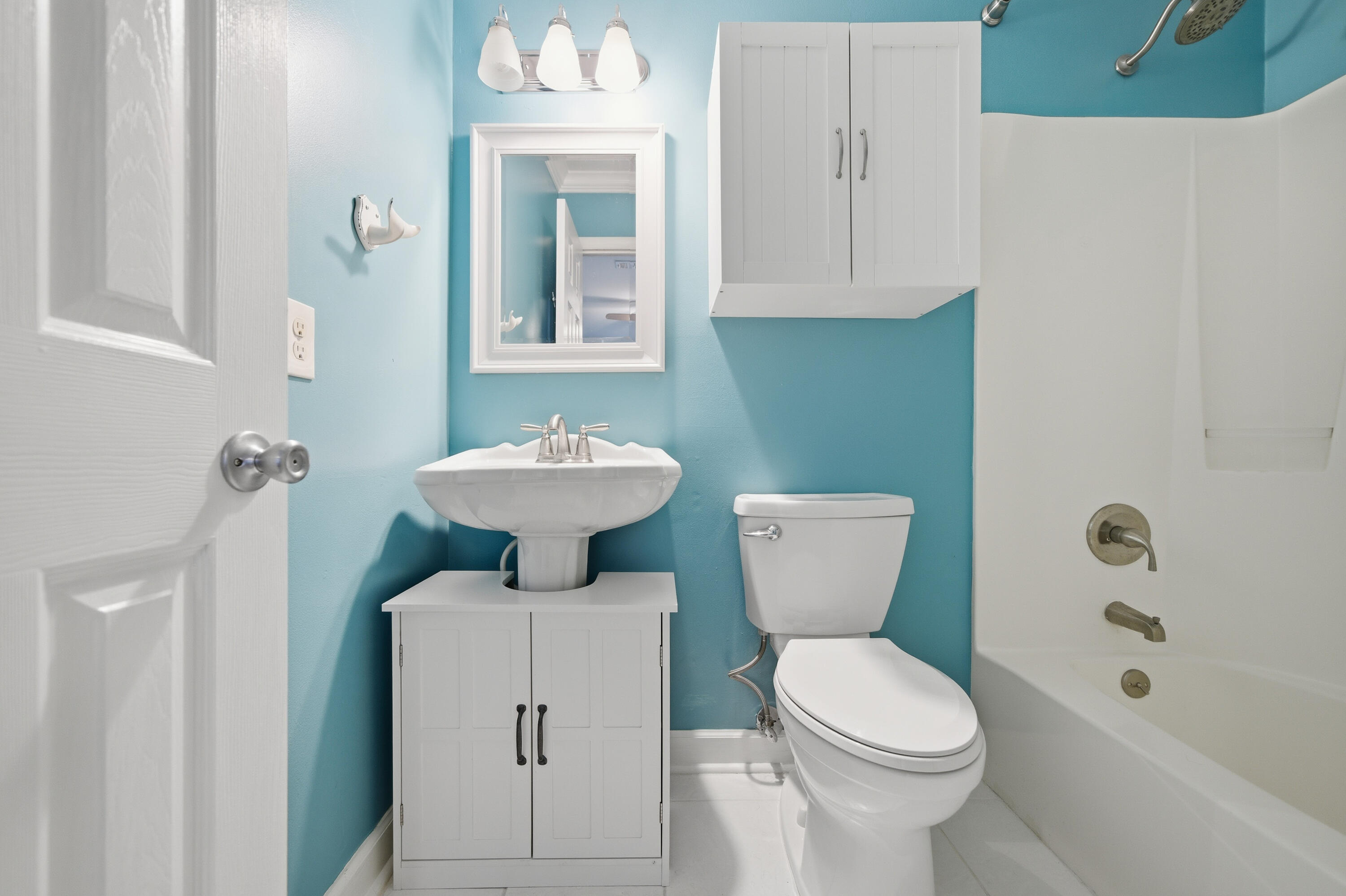 125 Durango Road Destin, FL 32541 - Photo 11 of 63 a bathroom with a toilet sink and mirror