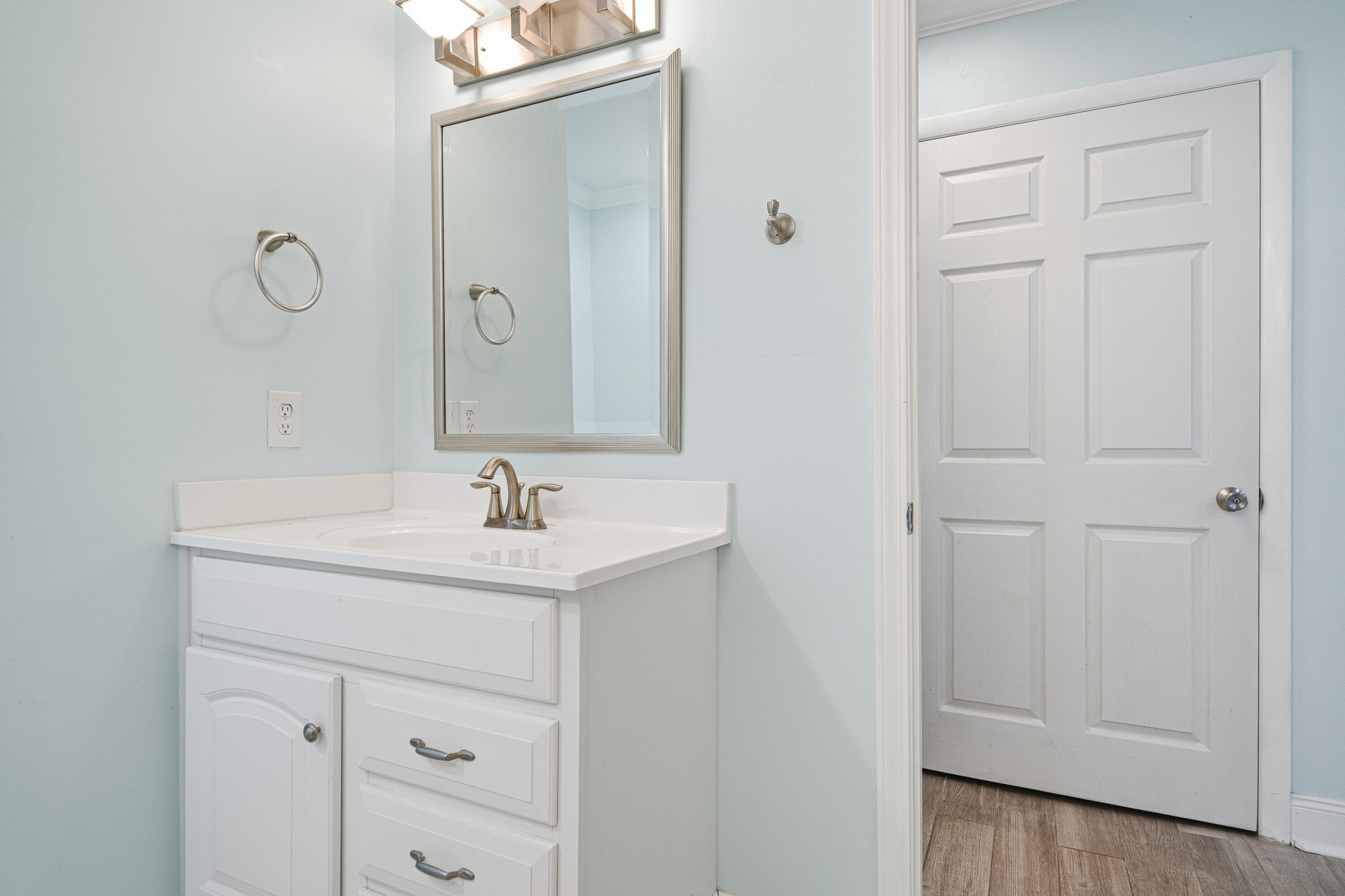 125 Durango Road Destin, FL 32541 - Photo 17 of 63 a bathroom with a sink and a mirror