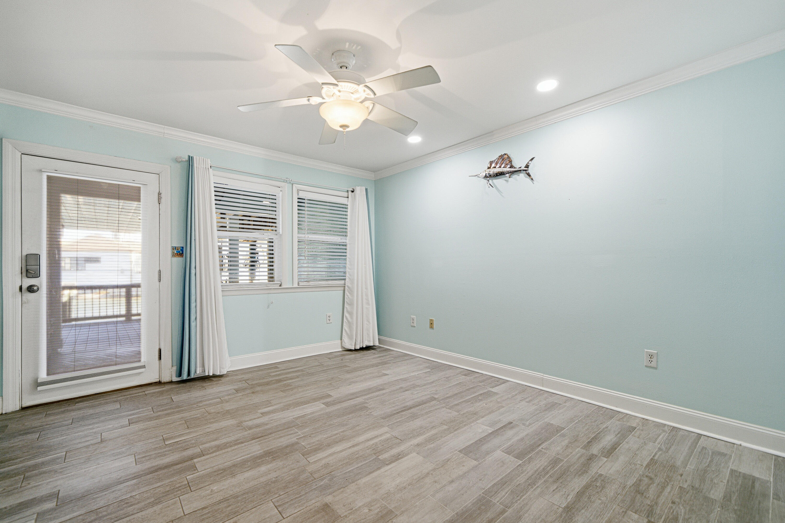 125 Durango Road Destin, FL 32541 - Photo 18 of 63 wooden floor in an empty room with a window