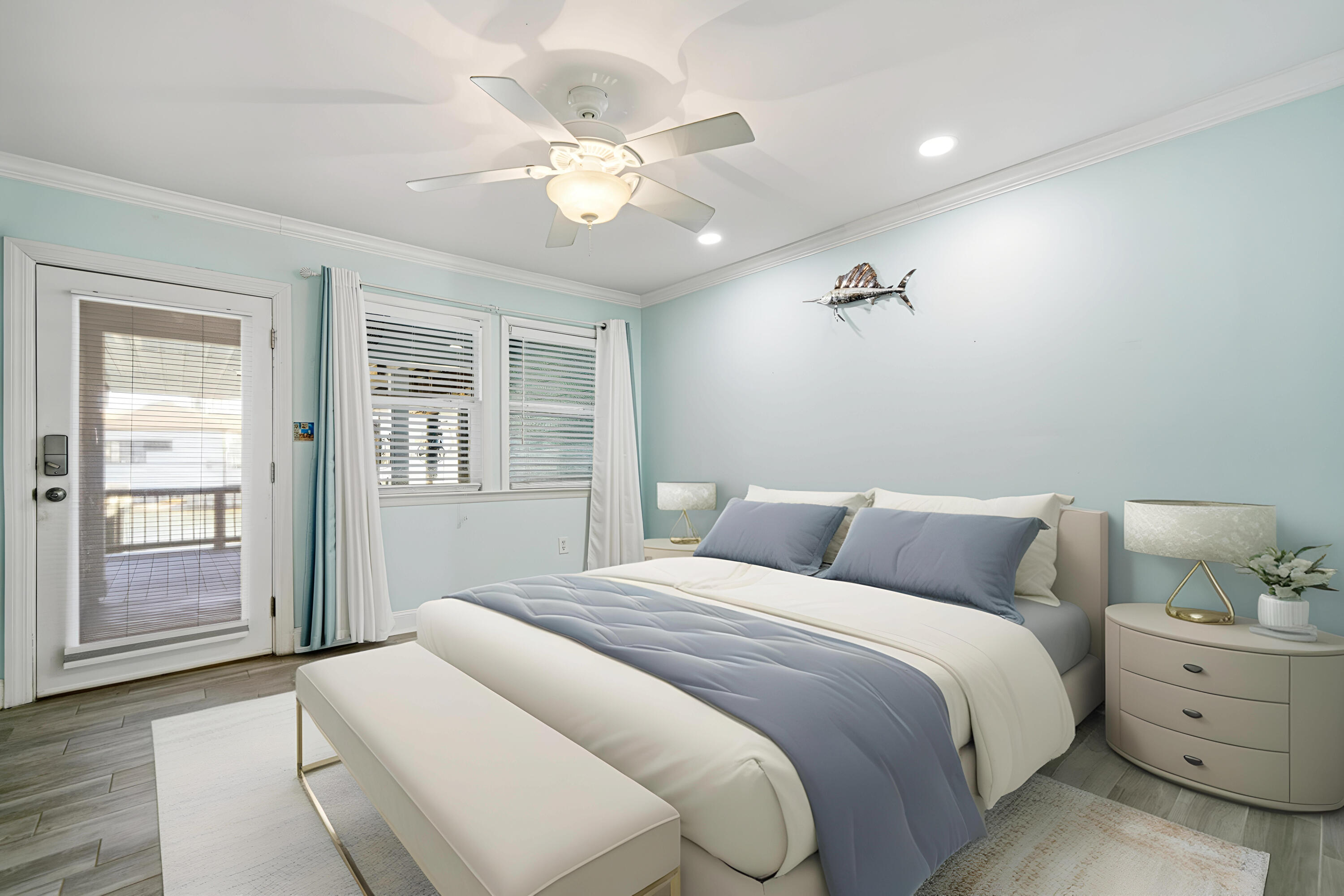 125 Durango Road Destin, FL 32541 - Photo 19 of 63 a bedroom with a large bed and chandelier