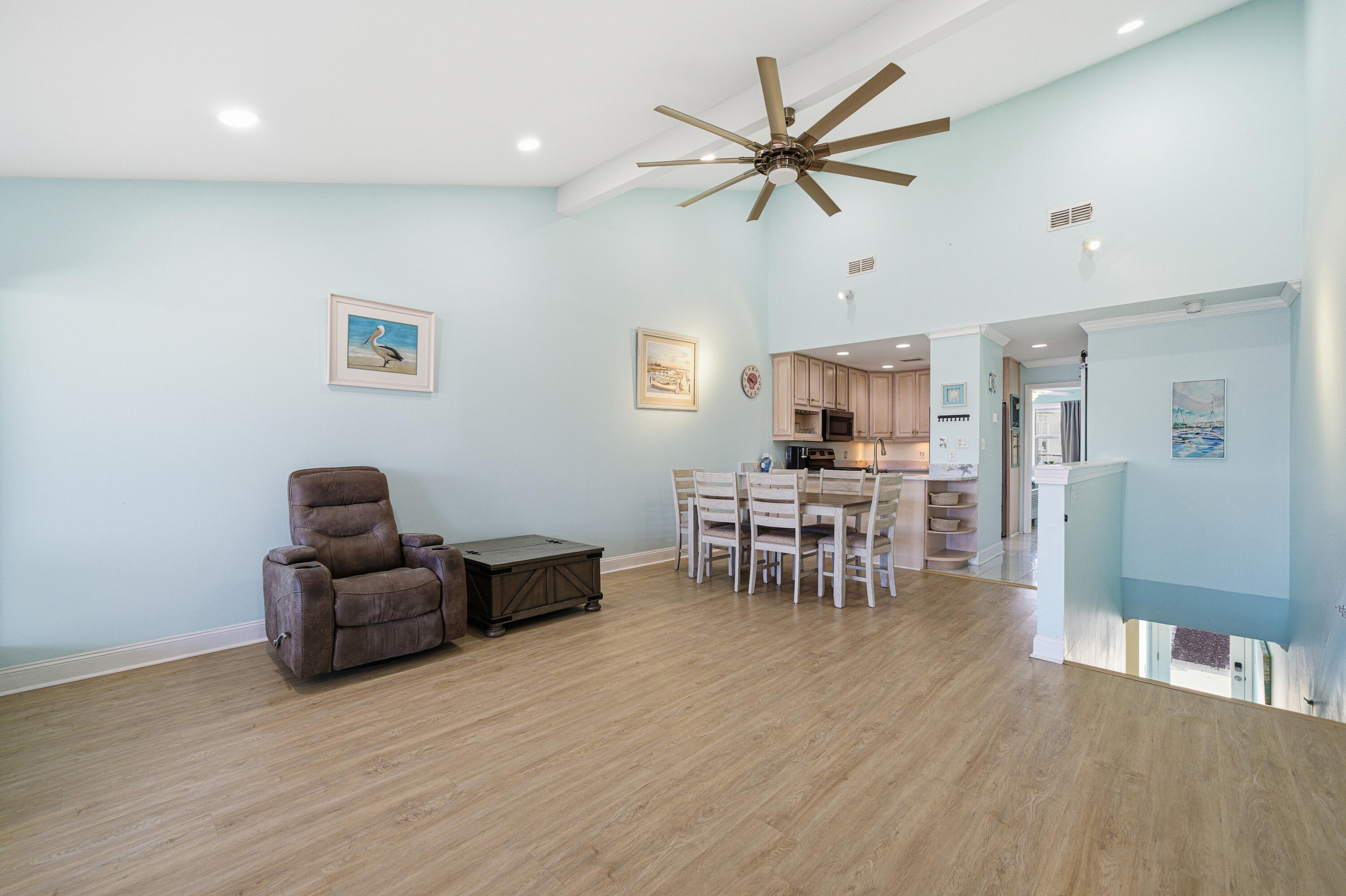 125 Durango Road Destin, FL 32541 - Photo 32 of 63 a living room with furniture and a wooden floor