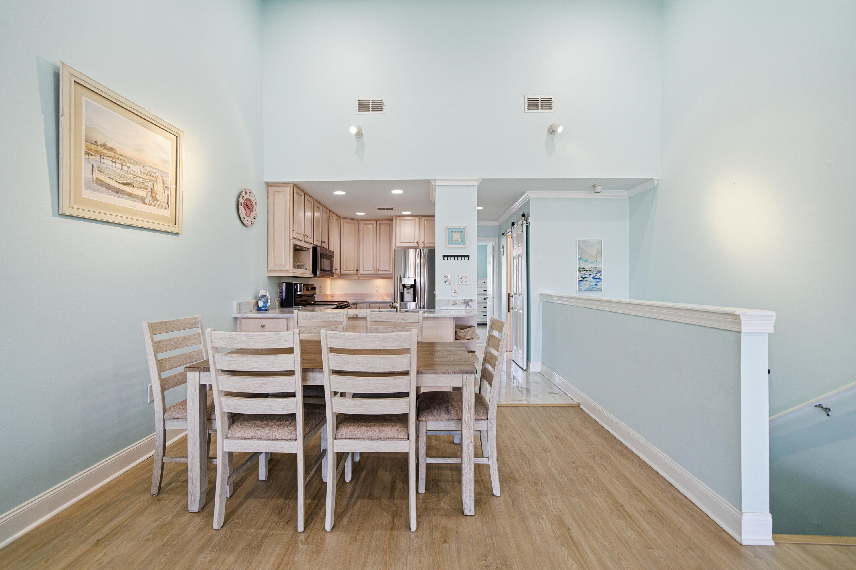 125 Durango Road Destin, FL 32541 - Photo 35 of 63 a dining room with furniture and wooden floor