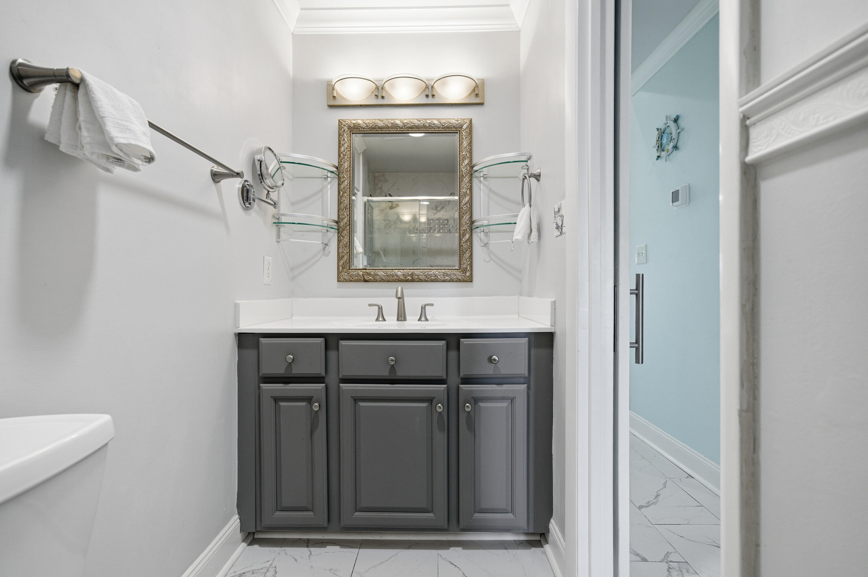 125 Durango Road Destin, FL 32541 - Photo 46 of 63 a bathroom with a sink and a mirror