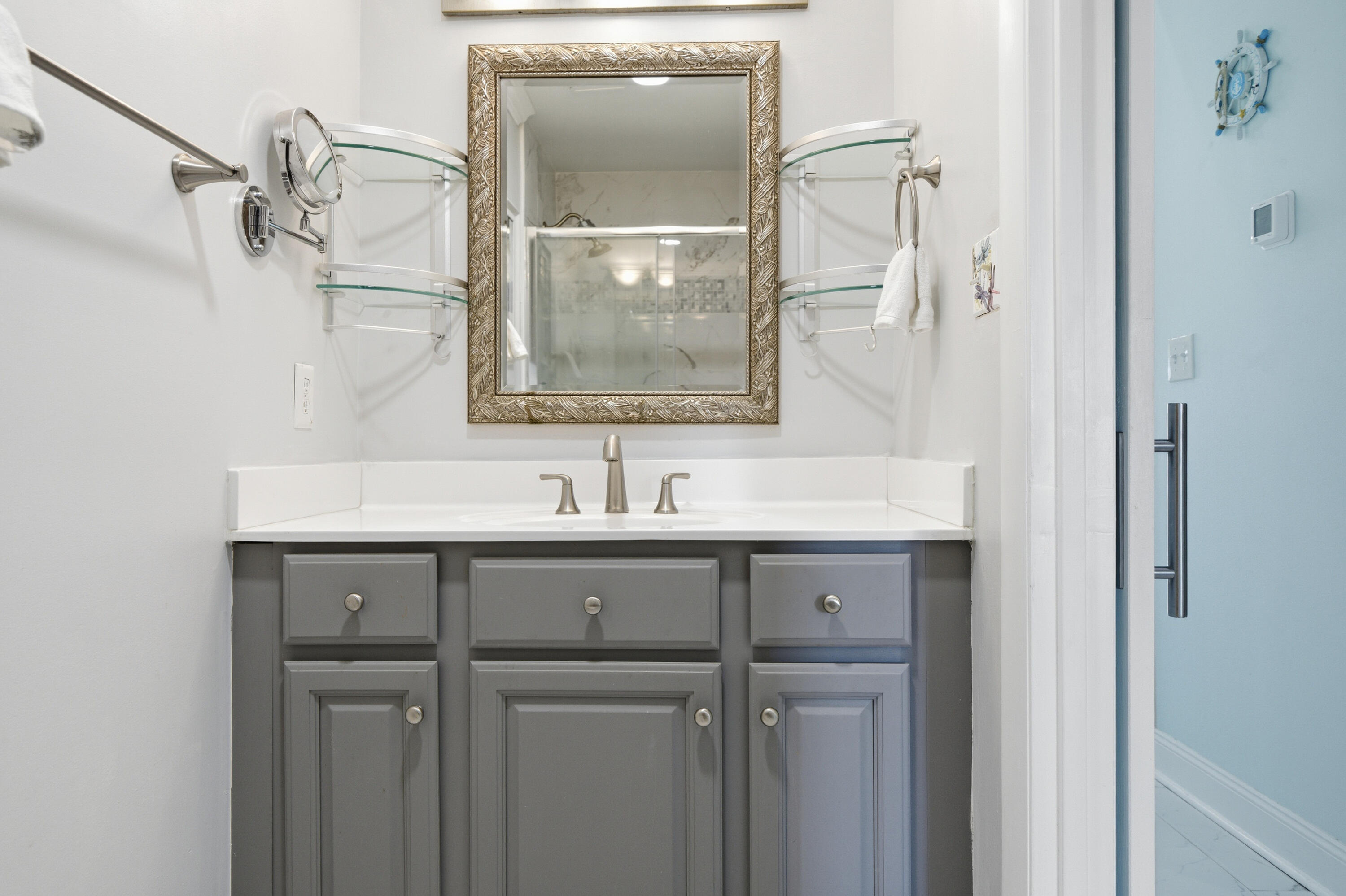 125 Durango Road Destin, FL 32541 - Photo 47 of 63 a bathroom with a sink and mirror