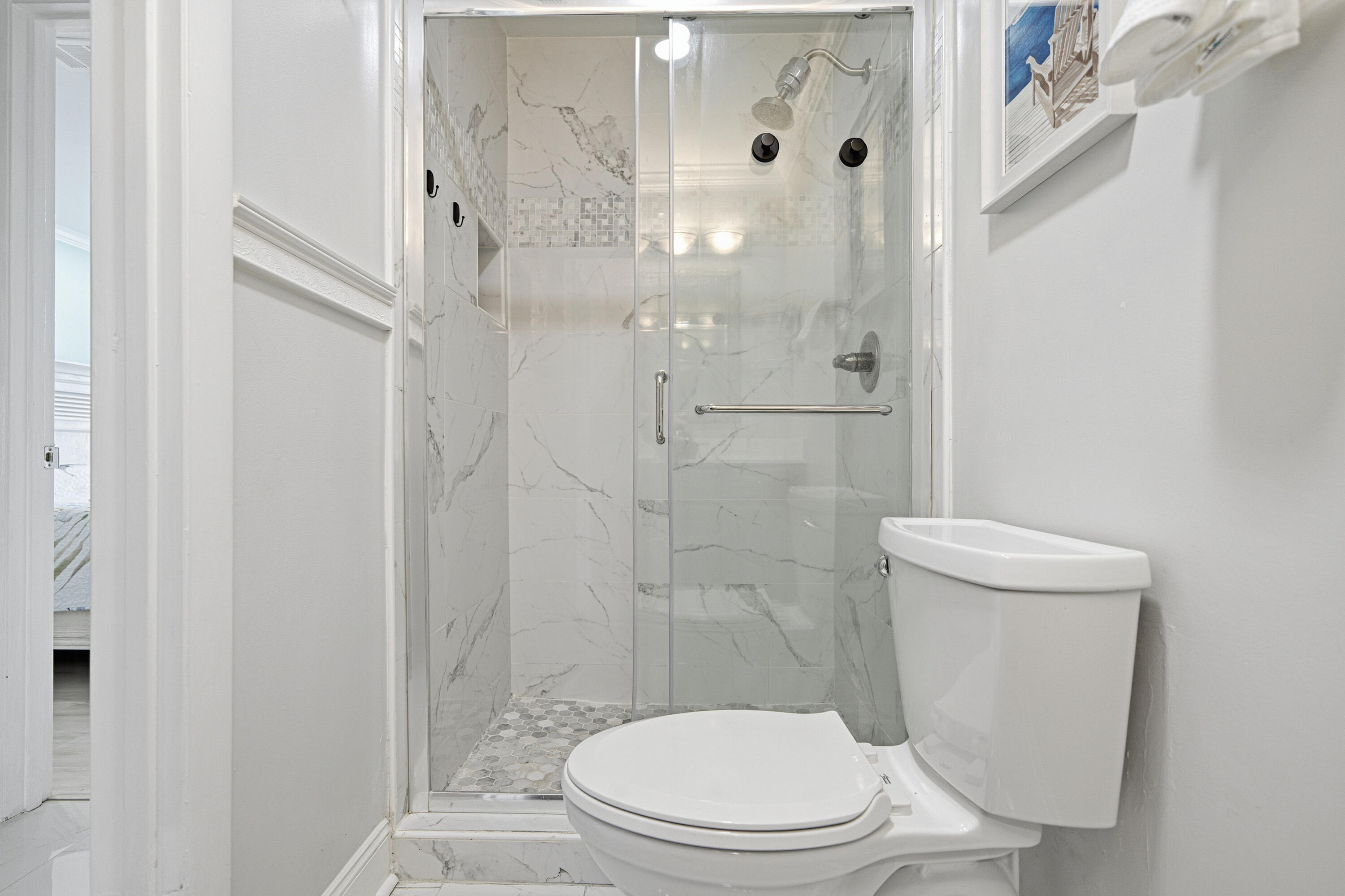 125 Durango Road Destin, FL 32541 - Photo 48 of 63 a white toilet sitting next to a bathroom sink