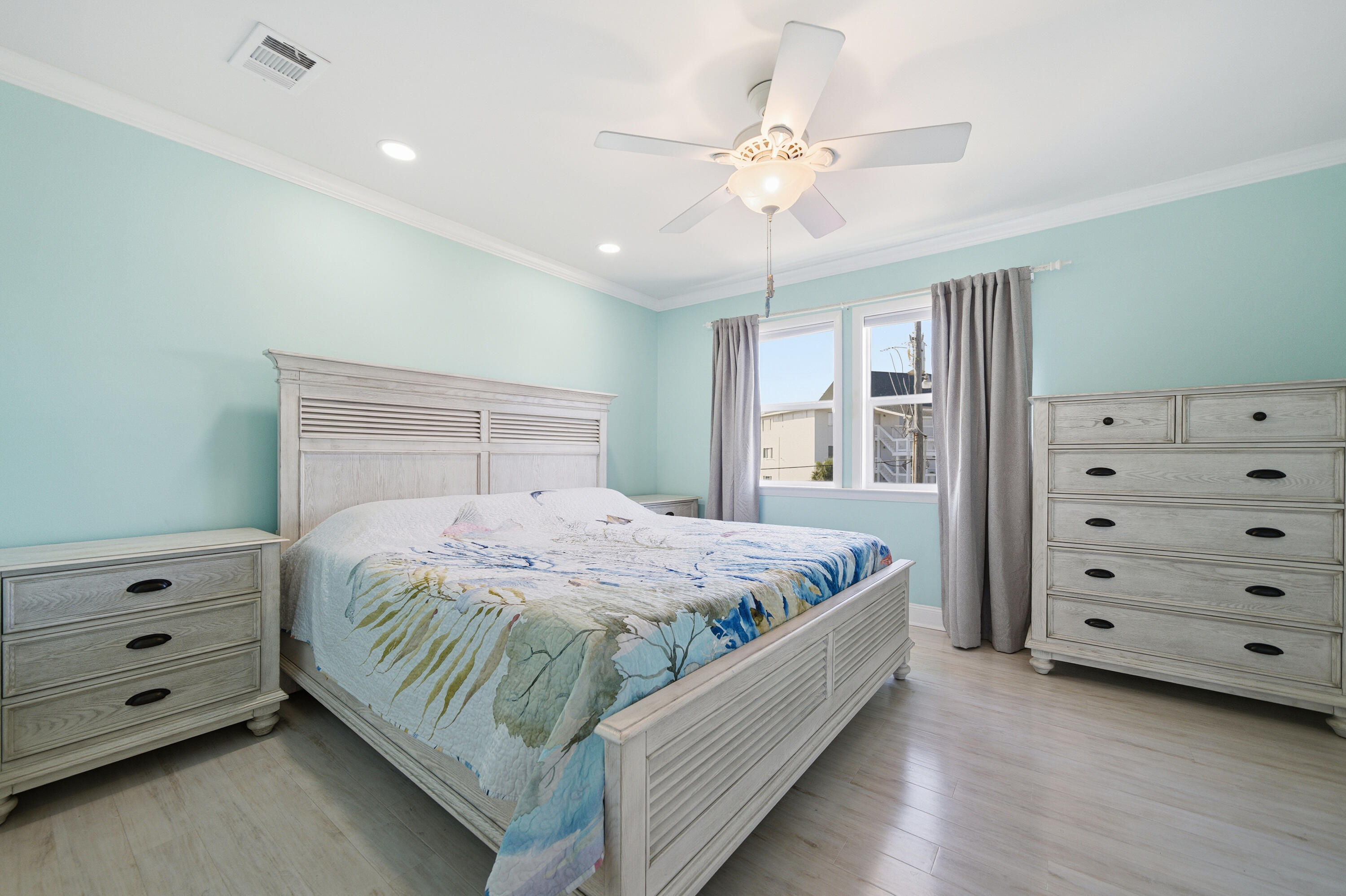 125 Durango Road Destin, FL 32541 - Photo 49 of 63 a bedroom with a bed and a dresser