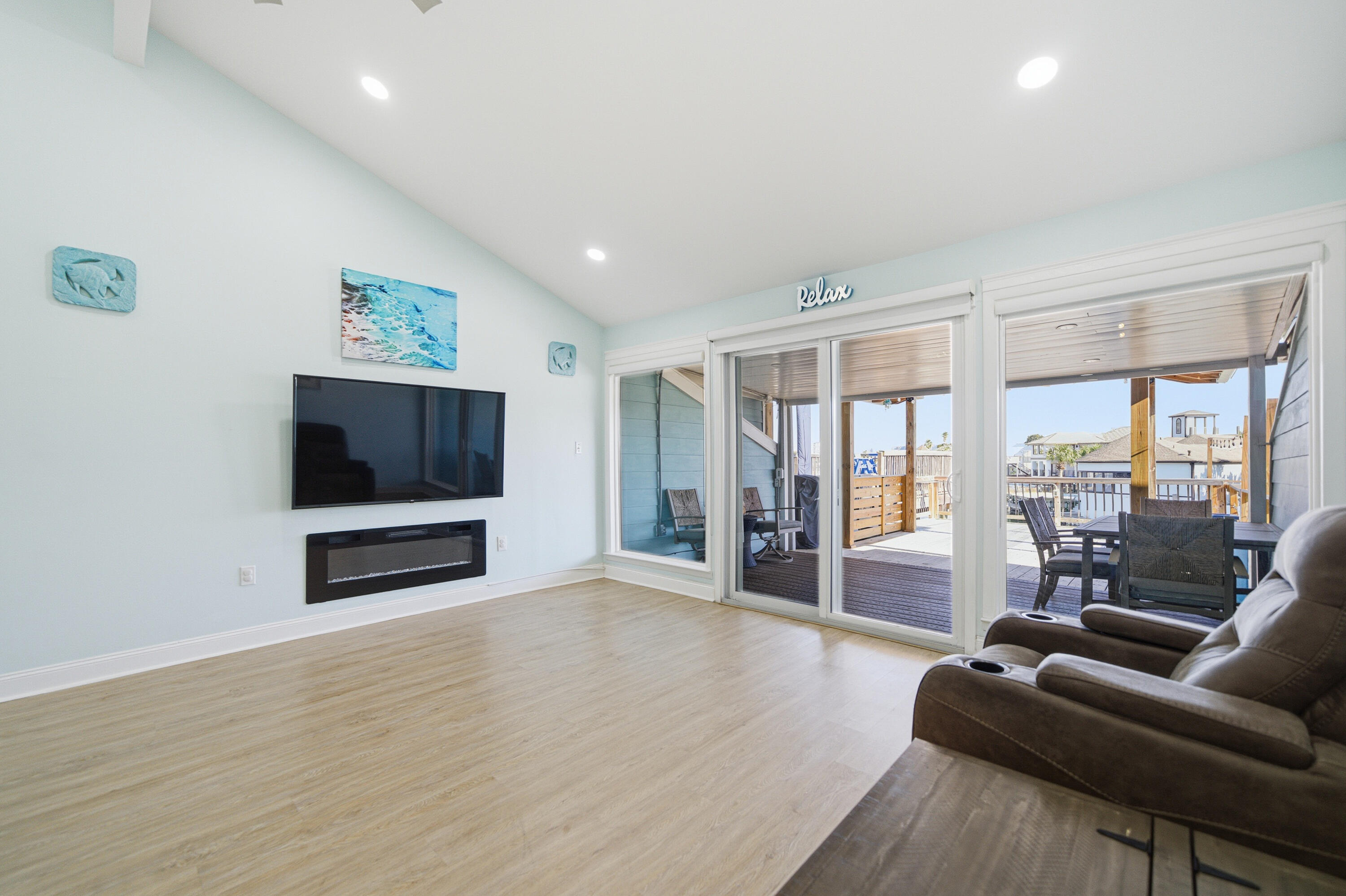 125 Durango Road Destin, FL 32541 - Photo 53 of 63 a living room with furniture and a flat screen tv