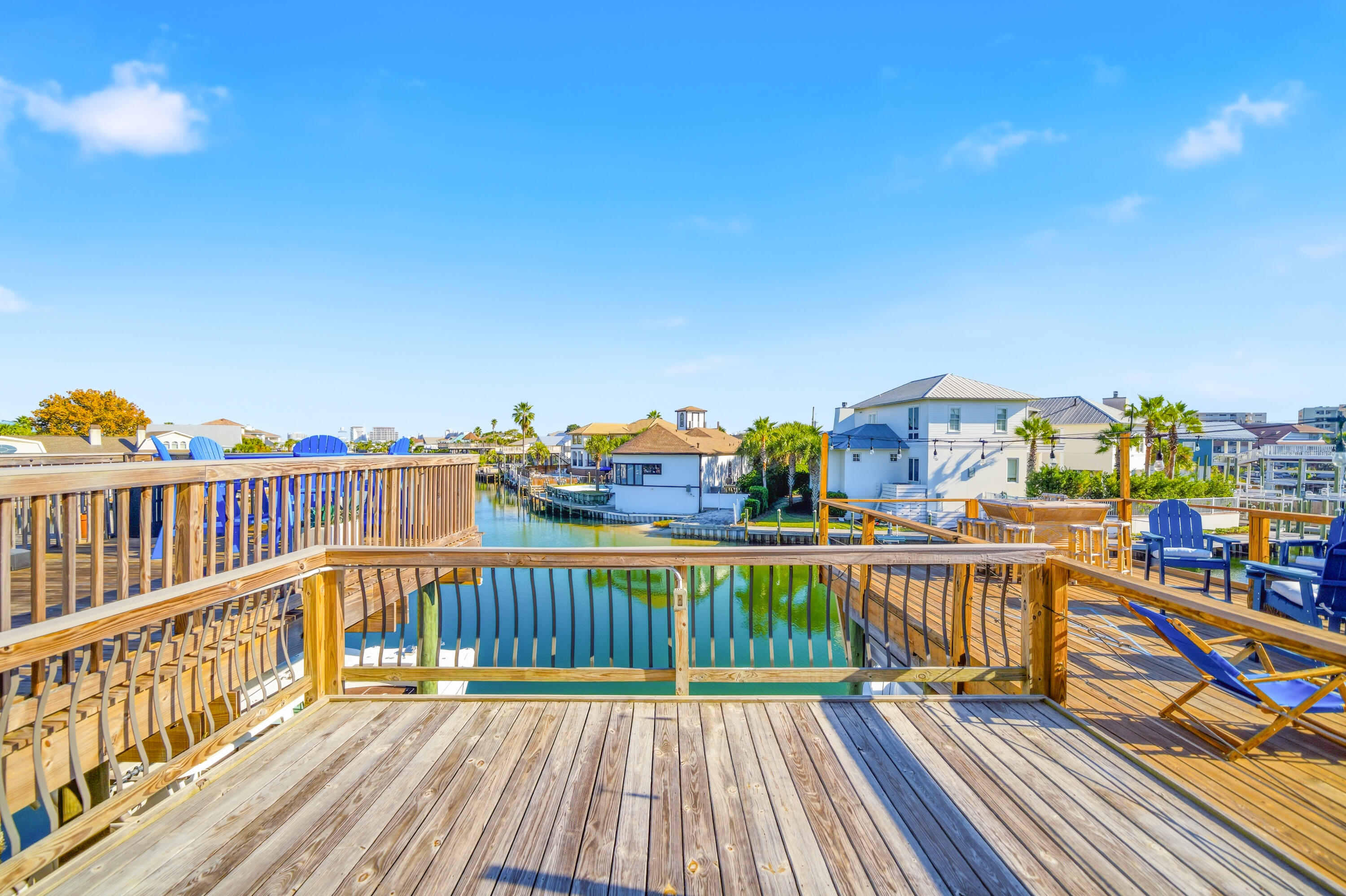 125 Durango Road Destin, FL 32541 - Photo 57 of 63 a view of a balcony with wooden floor and seating space