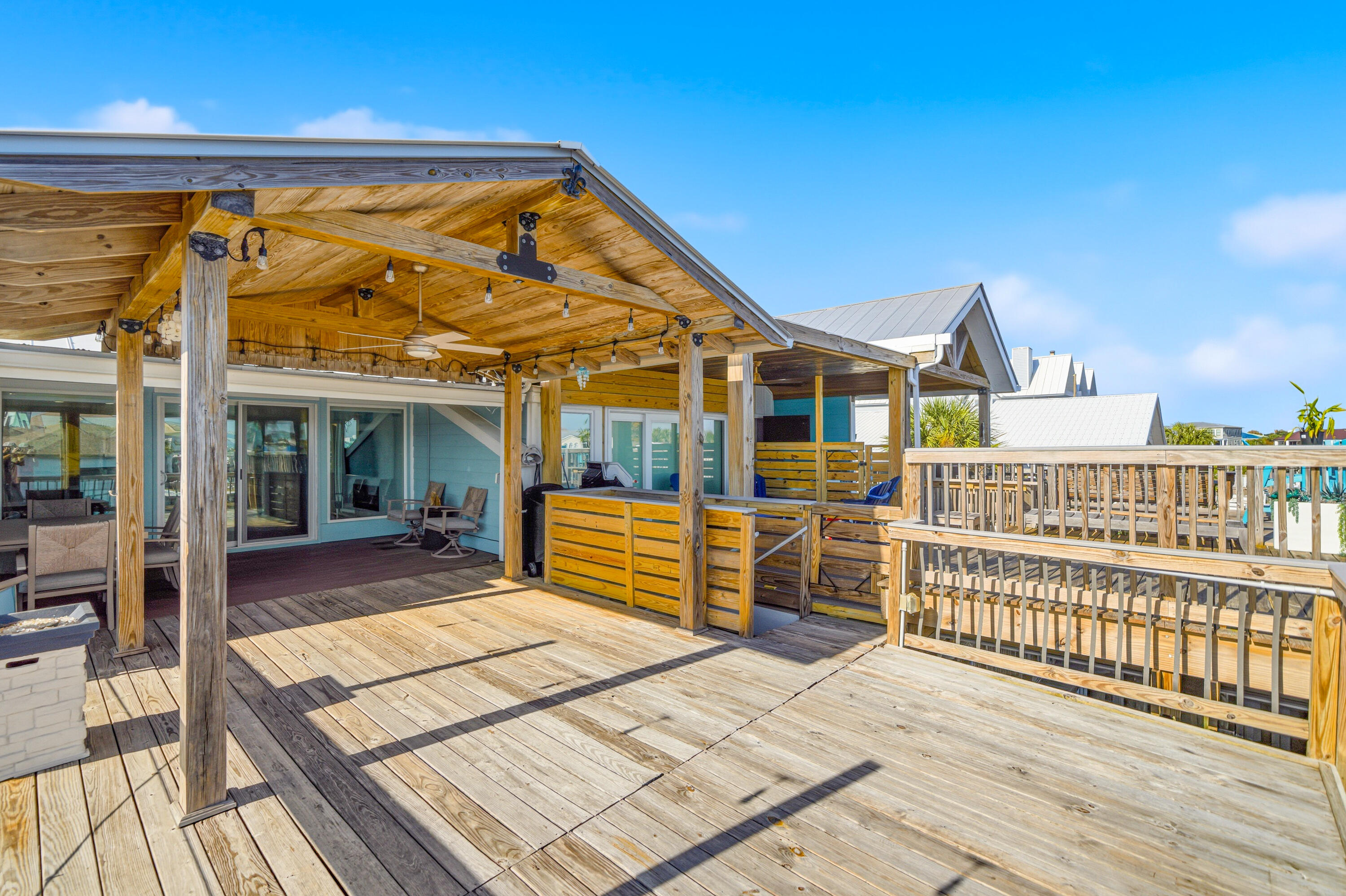 125 Durango Road Destin, FL 32541 - Photo 60 of 63 a view of a house with wooden deck