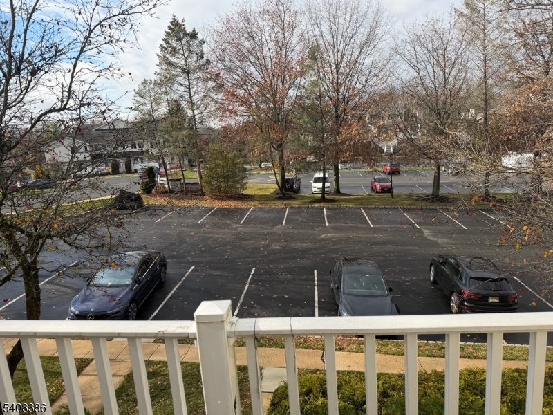 94 Wescott Road Bedminster, NJ 07921 - Photo 14 of 18 a view of a white house with a yard