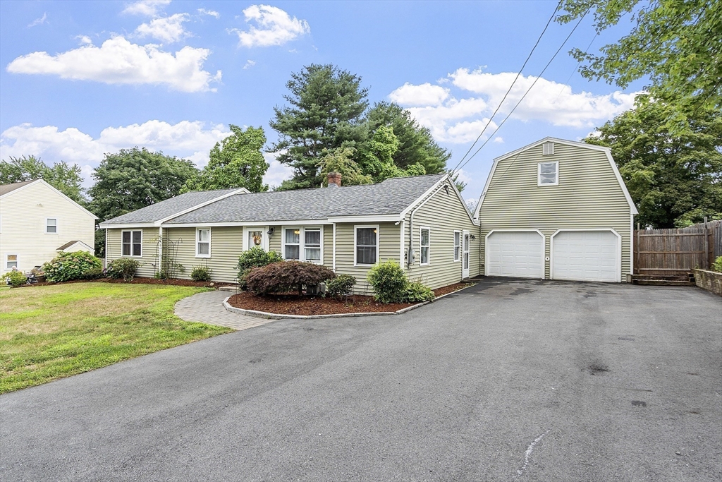 5 Elizabeth Road Billerica, MA 01821 - Photo 1 of 41 a front view of a house with garden