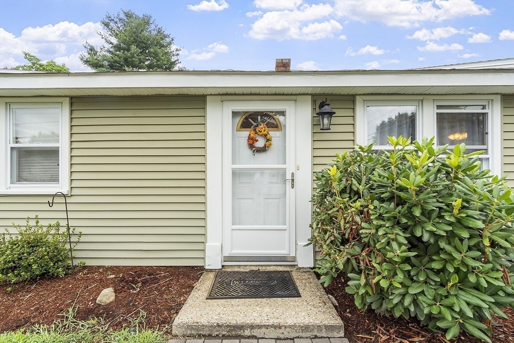5 Elizabeth Road Billerica, MA 01821 - Photo 2 of 41 a front view of a house with a garage