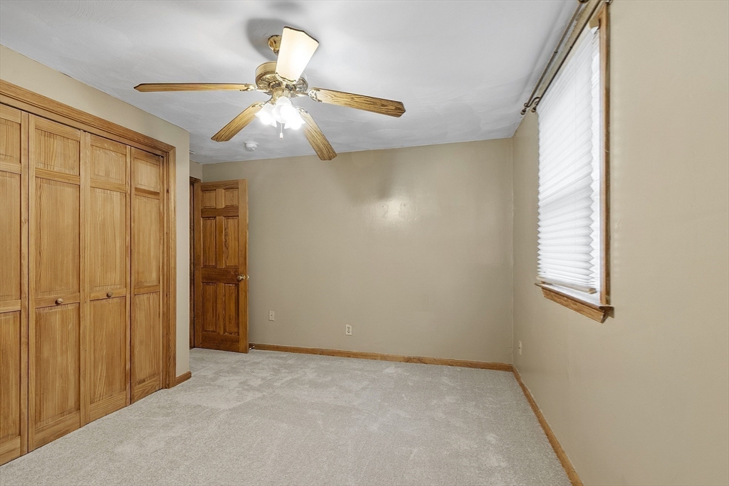 5 Elizabeth Road Billerica, MA 01821 - Photo 25 of 41 an empty room with windows and fan