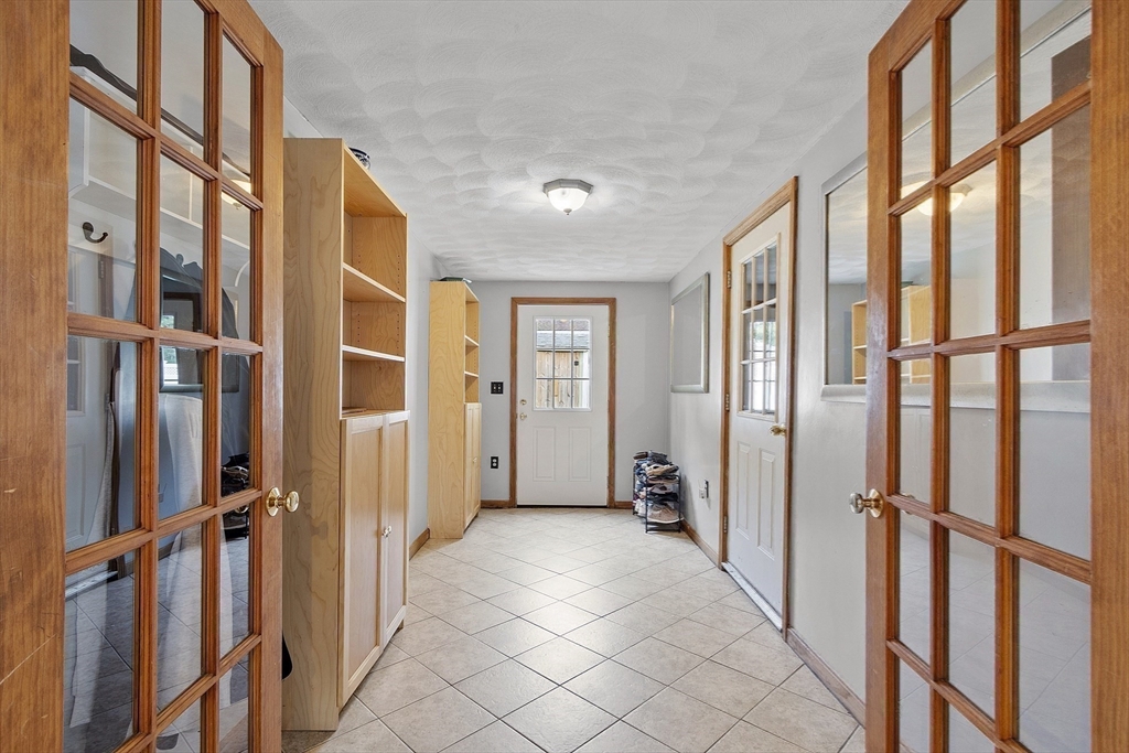 5 Elizabeth Road Billerica, MA 01821 - Photo 27 of 41 a view of an entryway with a glass door