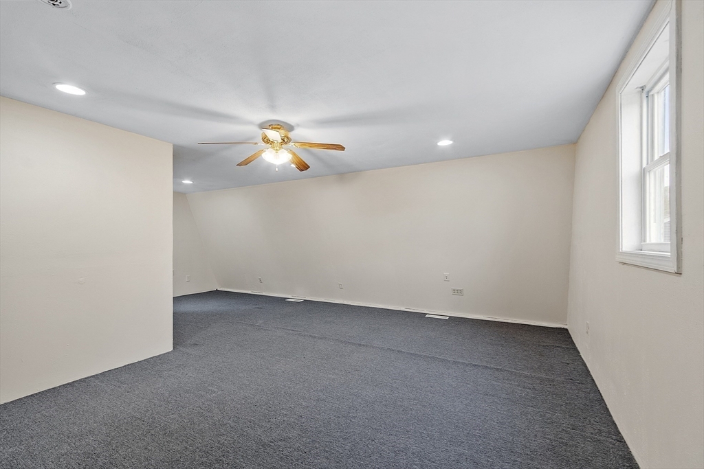 5 Elizabeth Road Billerica, MA 01821 - Photo 29 of 41 wooden floor in an empty room with a window