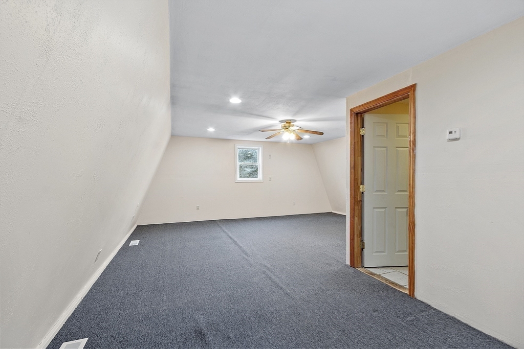 5 Elizabeth Road Billerica, MA 01821 - Photo 30 of 41 an empty room with a empty space and windows