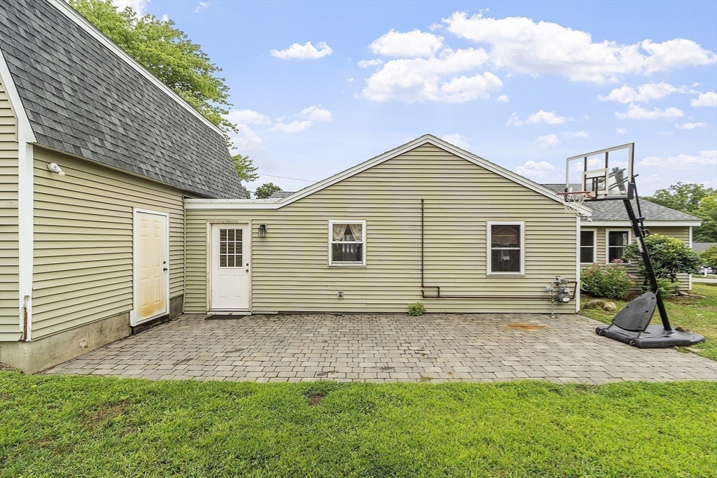 5 Elizabeth Road Billerica, MA 01821 - Photo 33 of 41 a front view of a house with a yard