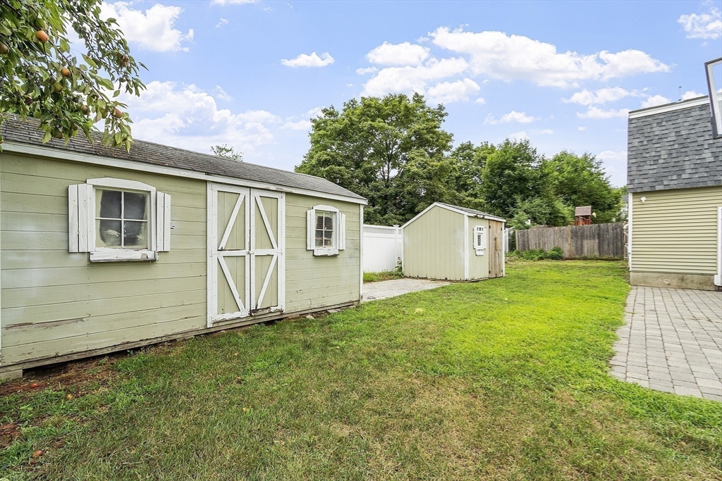 5 Elizabeth Road Billerica, MA 01821 - Photo 34 of 41 a view of a backyard with a garden