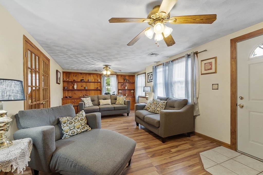 5 Elizabeth Road Billerica, MA 01821 - Photo 4 of 41 a living room with furniture and a large window