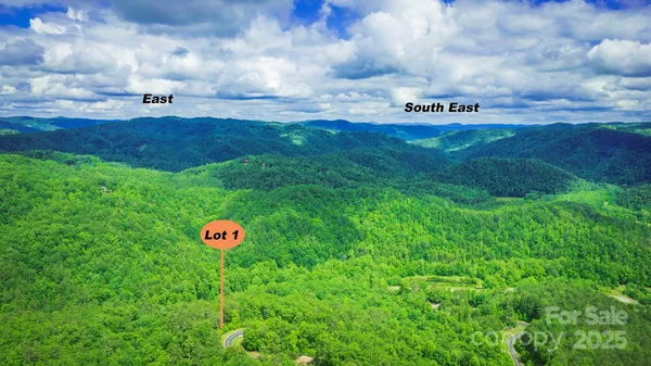 a view of a golf course with green space
