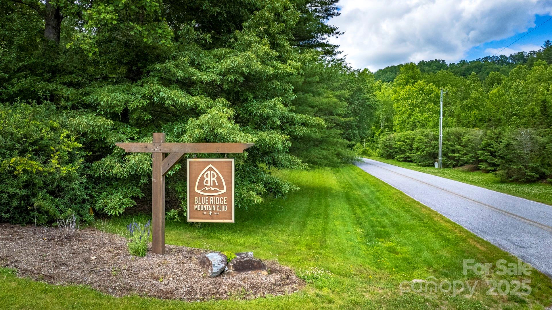 Lot 1 Reynolds Parkway Ferguson, NC 28624 - Photo 13 of 13 a green field with trees in the background