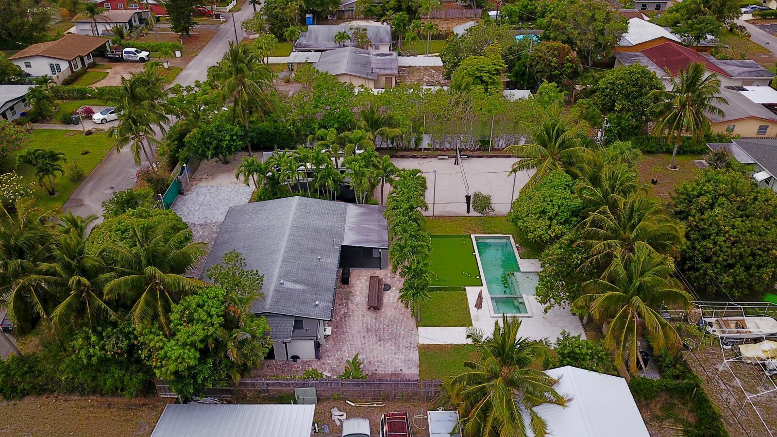 387 Enfield Street Boca Raton, FL 33487 - Photo 32 of 37 an aerial view of residential houses with outdoor space and street view