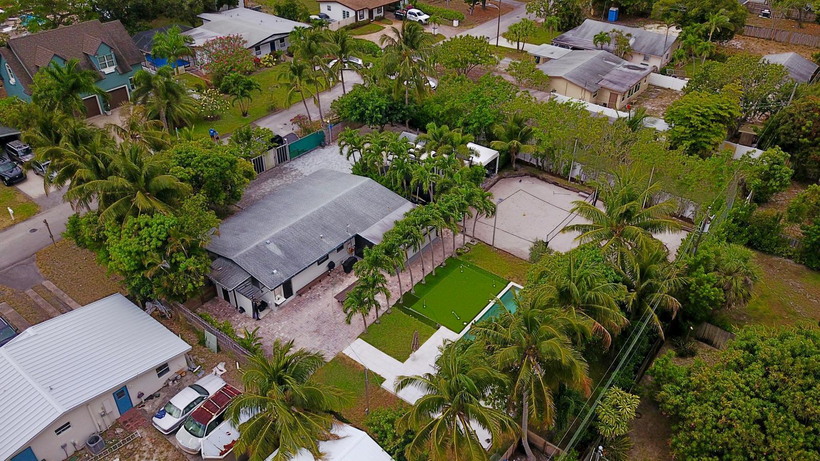 387 Enfield Street Boca Raton, FL 33487 - Photo 34 of 37 an aerial view of a house with a garden