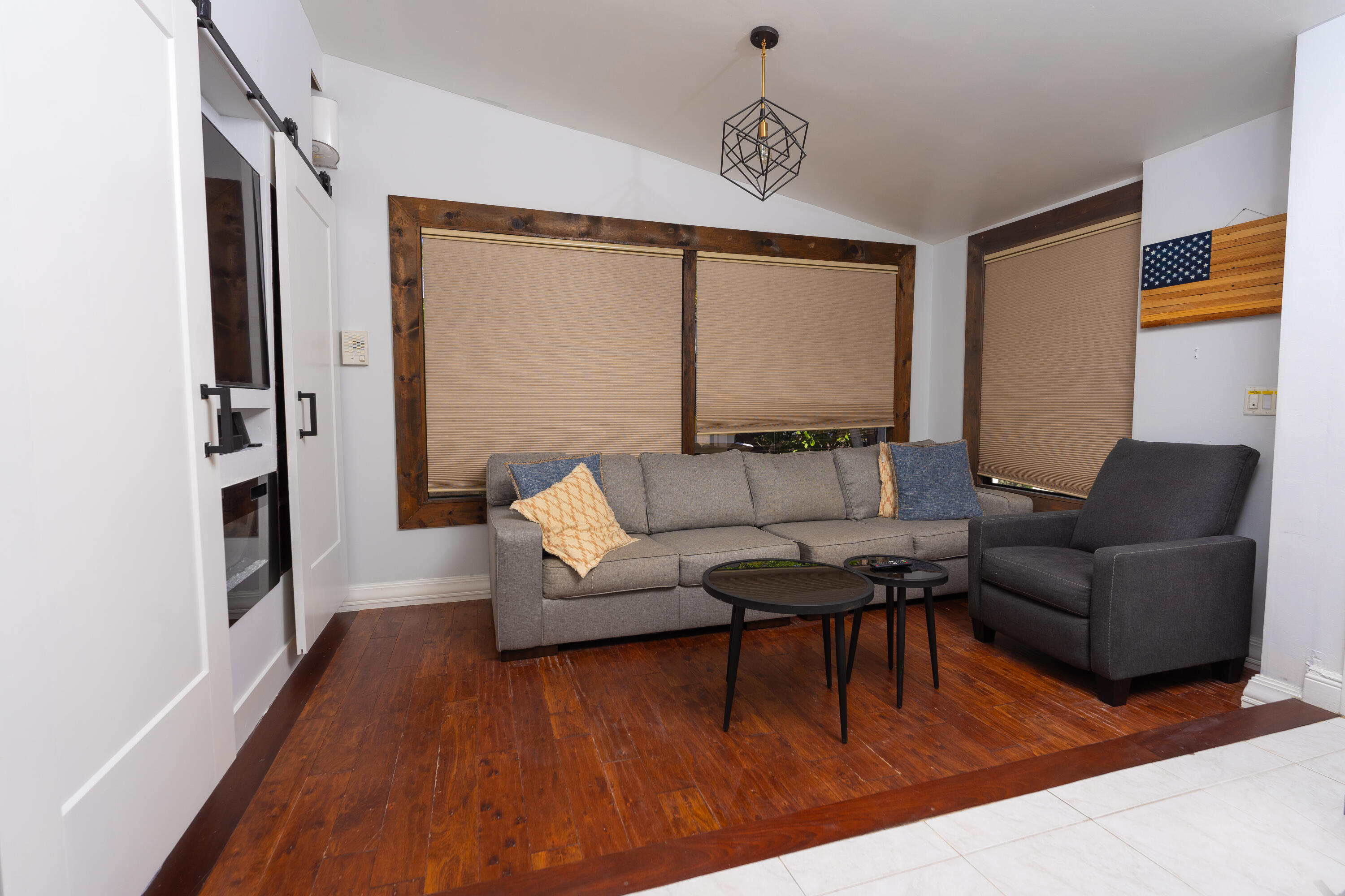 387 Enfield Street Boca Raton, FL 33487 - Photo 9 of 37 a living room with furniture and a wooden floor