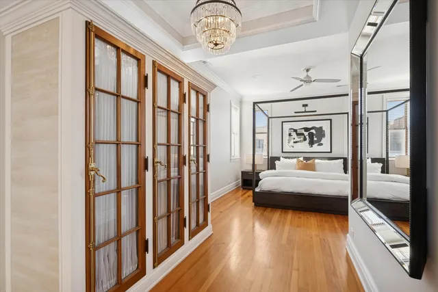 a view of living room with furniture and wooden floor