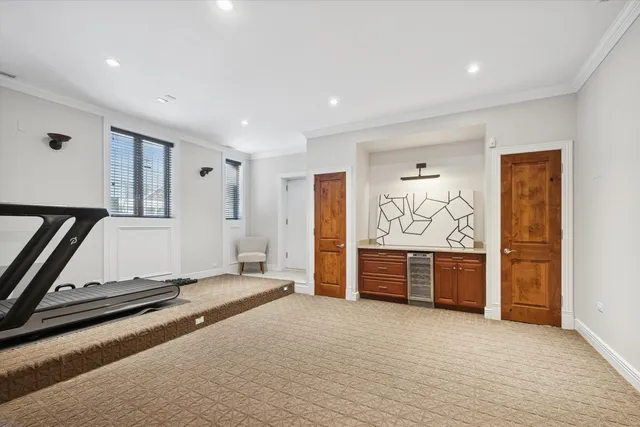 a spacious bathroom with a granite countertop tub sink and mirror