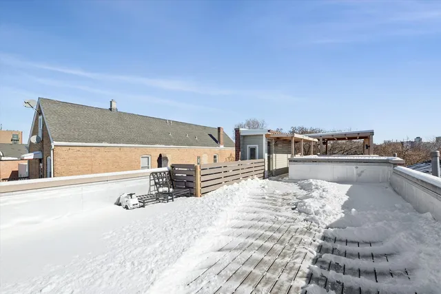 a view of a chairs and table in the patio
